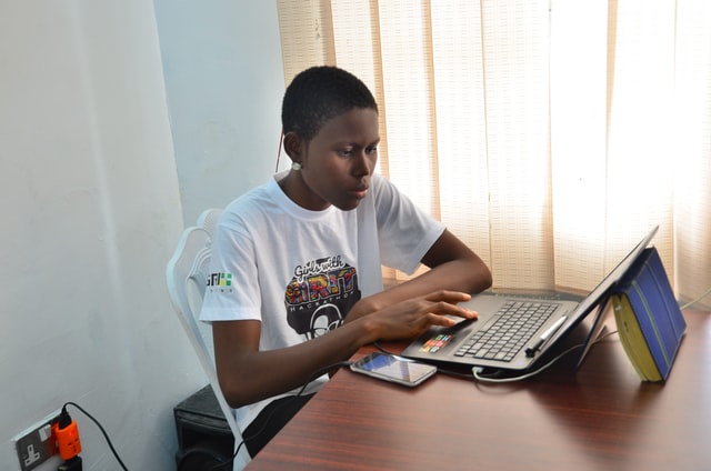 A student with a laptop