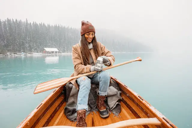 woman sitting inside a boat