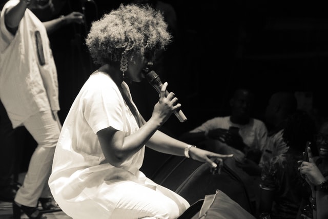 a woman performing at a Lagos concert