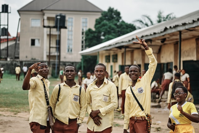 A group of students taking pictures