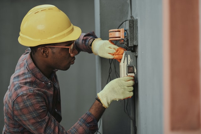 Man doing electrical installation