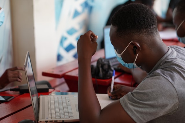 student studying with laptop