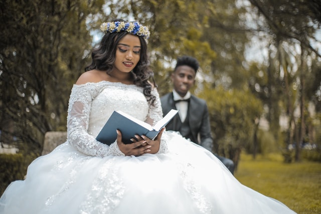 woman wearing white wedding gown