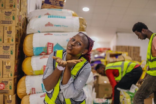 A lady inside a warehouse