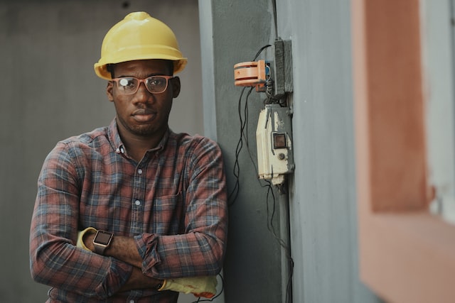 An electrician posing for the camera